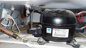 plugging-in-a-kenmore-upright-freezer-after-moving